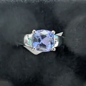 Elegant Silver Ring with Purple Gemstone